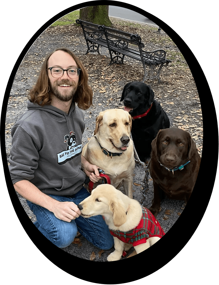 Doug with four dogs